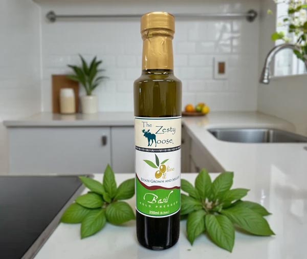 <b>Basil Fused Extra Virgin Olive Oil:</b> Crisp basil is pressed with just-harvested olives, crafting a blend fragrant with herbal aromas and bursting with basil flavor. Use as a fresh basil substitute. This oil is simply incredible for dipping and for tossed salads when paired with our Blackberry Balsamic Vinegar. Use it on sandwiches, tomato and pesto sauces, and pasta. Drizzle over meat, fish, roasted vegetables or brush on pizza dough.