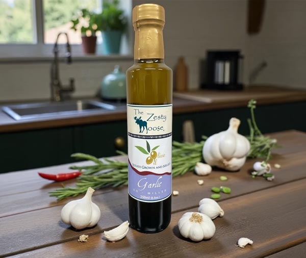 <b>Garlic Fused Extra Virgin Olive Oil:</b> For those who enjoy the spicy yet slightly sweet flavor of crushed garlic, this is the oil for you. Plump fresh garlic cloves are pressed with newly ripened California olives to craft the perfect flavor fusion of garlic and delicate olive oil. Garlic Extra Virgin Olive Oil is delicious for bread dipping, and creates mouth-watering sandwich spreads and spicy marinades. Delightfully spicy for everyday cooking use when you want a quick burst of flavor. No more burning the garlic! Use as a garlic clove substitute. Use it for sautéing, wonderful on pizza dough or drizzle on meats before grilling. It’s a favorite for garlic bread and bruschetta; A true garlic lover’s delight.